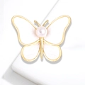 Elegant gold butterfly brooch with white enamel wings and a centered pearl on white background - YNCP5124 White / White