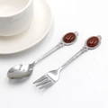Vintage stainless steel spoon and fork set featuring oval red-brown tiger eye stones - Red Agate