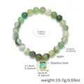 Dettaglio del bracciale con perline di agata verde e pendente in acciaio inossidabile oro - Stile Agata Verde (E661)