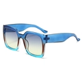 Modern square oversized sunglasses featuring transparent blue frames and gradient lenses - Blue Frame Blue Yellow Lens