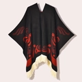 Detail of black knit poncho featuring ethnic red patterns and white fringe tassels - 130x150cm / Pullover Colorful Bird Black Red