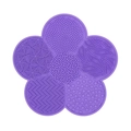 Purple flower-shaped silicone makeup brush cleaning mat with various textures and suction cups - Flower Shape / Purple