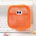 Close-up of orange mesh organizer bag featuring large cartoon eye embroidery detail - 13*7*13cm / Orange