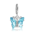 Macro detail of silver butterfly pendant with blue gemstone wings and clear diamonds - Light Blue