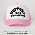 Detailed macro view of retro pink trucker hat featuring Support Day Drinking black print - One Size / Pink and White