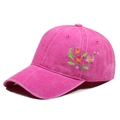 Detail of floral embroidery on rose pink washed cotton baseball cap with textured finish - Adjustable / Rose Red