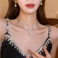 Elegant silver teardrop necklace and earrings set with shimmering crystals on model - Silver Water Drop Necklace 2pcs Set (83#)