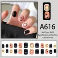 Vue détaillée du set de 24 faux ongles AL13 motif chien dessin animé noir et orange - Style Patchwork Empreinte de Chien Dessin Animé (A616)
