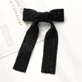 Close-up of elegant handmade black beaded bow hair clip with detailed woven texture - Black Beaded Bow Clip