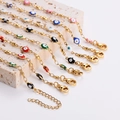 Goldene Edelstahlarmbänder mit farbenfrohen Emaille-Anhängern im Evil-Eye-Design und Karabiner - Rosa Auge / Gold