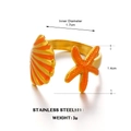 Verstellbarer Ring aus goldenem Edelstahl mit Seestern, Muschel und orangefarbener Emaille - Orange