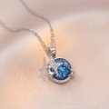 Starry blue planet necklace in silver finish with pavé zircon stars on silk background - Silver Blue Planet