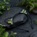 Detail of handmade cat ear headband with green crystals and beads on natural rocks - Olive Crackle Cat Ears