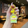 Mignon porte-clés personnage durian jaune avec paillettes en résine acrylique fluide - Style Mousqueton / Matériel Jaune Perle de Bulle Lumineuse Sœur Fruits