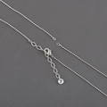 Detail of silver bead chain with lobster clasp, extender, and faceted crystal pendant - Silver Round Bead Chain