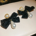 Detailed view of elegant bow earrings with white waterdrop pearls and gold metal edging - Black Beaded Bow Water Drop Pearl Style (Silver Pin)