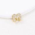 Detailed macro view of a gold-plated letter M pendant set with sparkling cubic zirconia - M (Single Pendant)