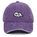 Close-up of cute seal embroidery on purple washed cotton baseball cap with seam details - Purple