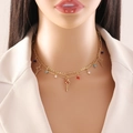 Double-layered gold necklace with star charms and colorful beads on a beige blazer model - Star and Colorful Beads Style (1# Cross Star)