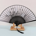 Japanese style folding fan with black butterfly floral print and elegant black tassel - Black Ribs Pattern 50