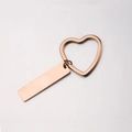 Detail of rose gold heart-shaped keychain with rectangle metal tag for custom engraving - Rose Gold