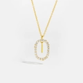 Close-up of gold plated oval pendant necklace with sparkling white zircons set in a frame - Letter I