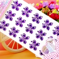 Close-up of purple butterfly acrylic gemstone stickers for kids face and phone decoration - Butterfly Dark Purple