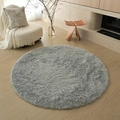 Plush round grey area rug made of soft silk faux fur for modern living room decor - Silver Grey