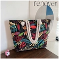 Detail of colorful leaf print canvas tote with thick cotton rope handle on wood - Black Colored Leaves