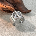 Adjustable silver wide band stainless steel ring featuring a classic toggle bar design - Silver