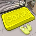 Yellow 3D soap-shaped diatom mud bath mat with SOAP relief on bathroom floor - 30x40cm / Soap Yellow