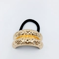 Detailed close-up of golden alloy hair ring with molten texture and black elastic band - Embossed Lava Arc Hair Tie (15)