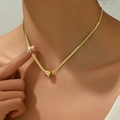 Collana a serpente minimalista in acciaio inossidabile dorato con un ciondolo a perla rotonda - 14k / Oro