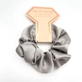 Grey satin hair scrunchie on rose gold bridesmaid proposal card for wedding favors - Gray