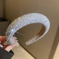 Chic silver headband with sparkling rhinestones and white pearls in a wide padded design - Silver