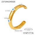 Bracciale rigido in acciaio al titanio dorato con motivi malocchio blu e bianchi - Oro