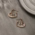 Elegant 18K gold plated heart drop earrings with star moon motifs and white cubic zirconia - Star Moon Heart Pendant / Gold