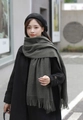 Deep green long cashmere scarf with tassels styled on a model for winter fashion - Cationic Viscose Style / 200x70cm / Dark Heather Grey