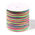 Detailed view of 0.8mm rainbow colored cord on a white spool for DIY jewelry making - 0.8mm Diameter (Approx. 90m/Roll) / Colorful