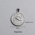 Detail of 25mm silver Aquarius zodiac coin pendant showing 3mm thickness and engraving - Aquarius Zodiac Sign Pendant (P00061S)