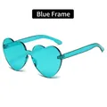 Trendy rimless heart-shaped sunglasses with vibrant teal lenses and blue frames - Blue