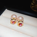 Macro view of pink pearl and iridescent crystal stud earrings in a luxury box - Square Pink Zirconia Pink Pearl Style / Gold-Pink (Real Gold Plated)
