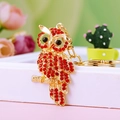Golden owl keychain pendant with sparkling red rhinestones and black gem eyes - A430 Owl M Red