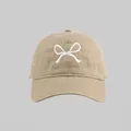 Classic khaki canvas baseball cap featuring white ribbon bow embroidery on the front - Line Bow Embroidered Baseball Cap Style / Khaki