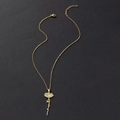 Detail of gold stainless steel necklace with Arabic calligraphy and floral flower pendant - November Birth Flower (Chrysanthemum) / Gold