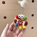 Handmade brown wool felt cookie keychain with colorful dots and a red heart - Happy Cookie