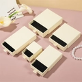 Creamy white drawer jewelry boxes in multiple sizes with black velvet lining - Beige