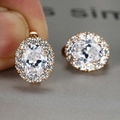 Oval cut white zircon earrings with halo setting in rose gold finish for women - Rose Gold/White Zirconia