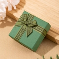 Elegant green square jewelry gift box featuring a decorative ribbon with Best Wishes text - Cross Pattern Green Bow