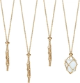 Detailed view of adjustable golden metal cage necklace holding a smooth white crystal stone - Gold Large Mesh Cage